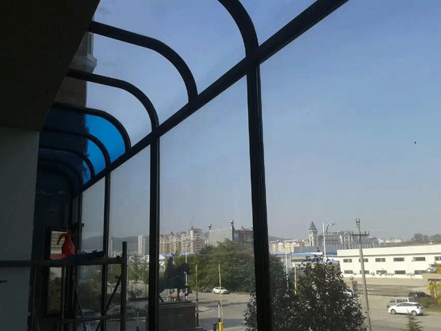 ??煙臺芝罘區泰晤士新城門頭房隔熱膜貼膜現場